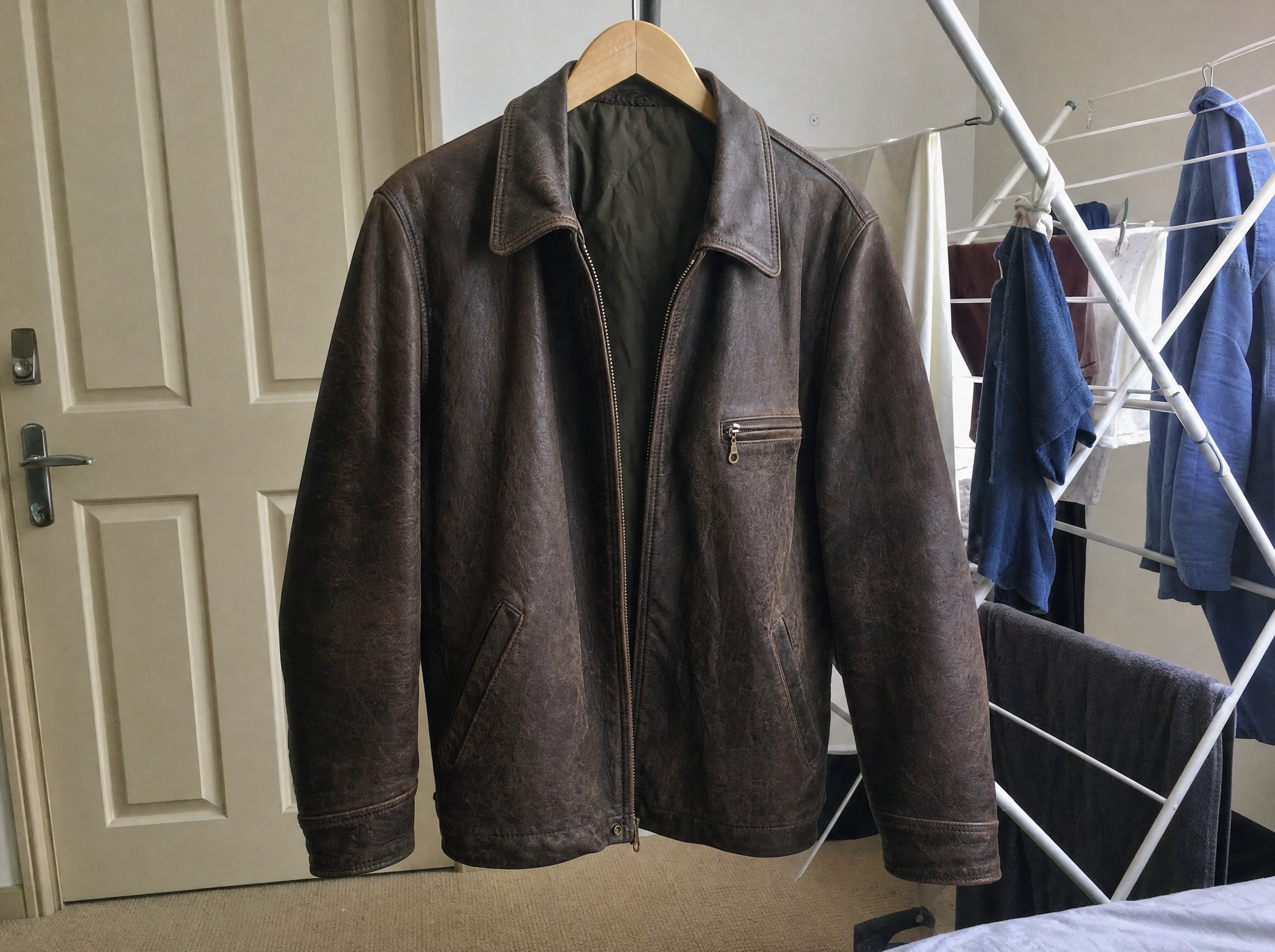 Trước — leather jacket product photo